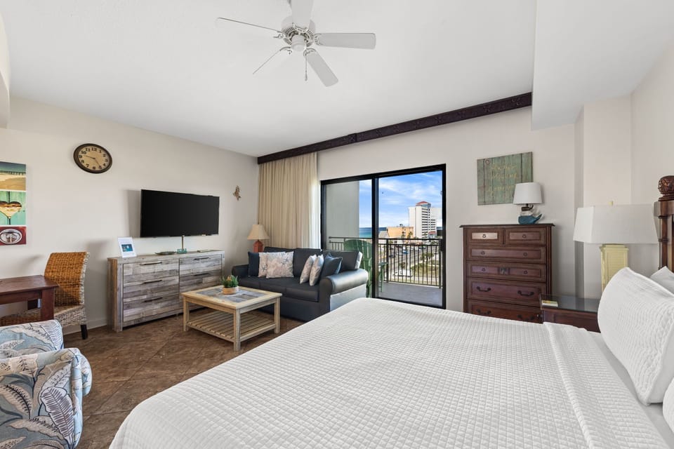 Sink into plush comfort with coastal breezes and ocean glimpses just beyond your private balcony. Your perfect retreat combines homey charm with seaside serenity.