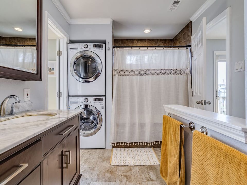 Washer and dryer located in bathroom for your convenience :)