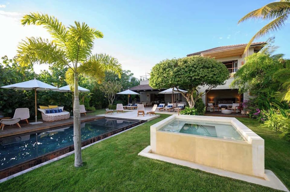 Resort-style outdoor living with multiple lounge areas