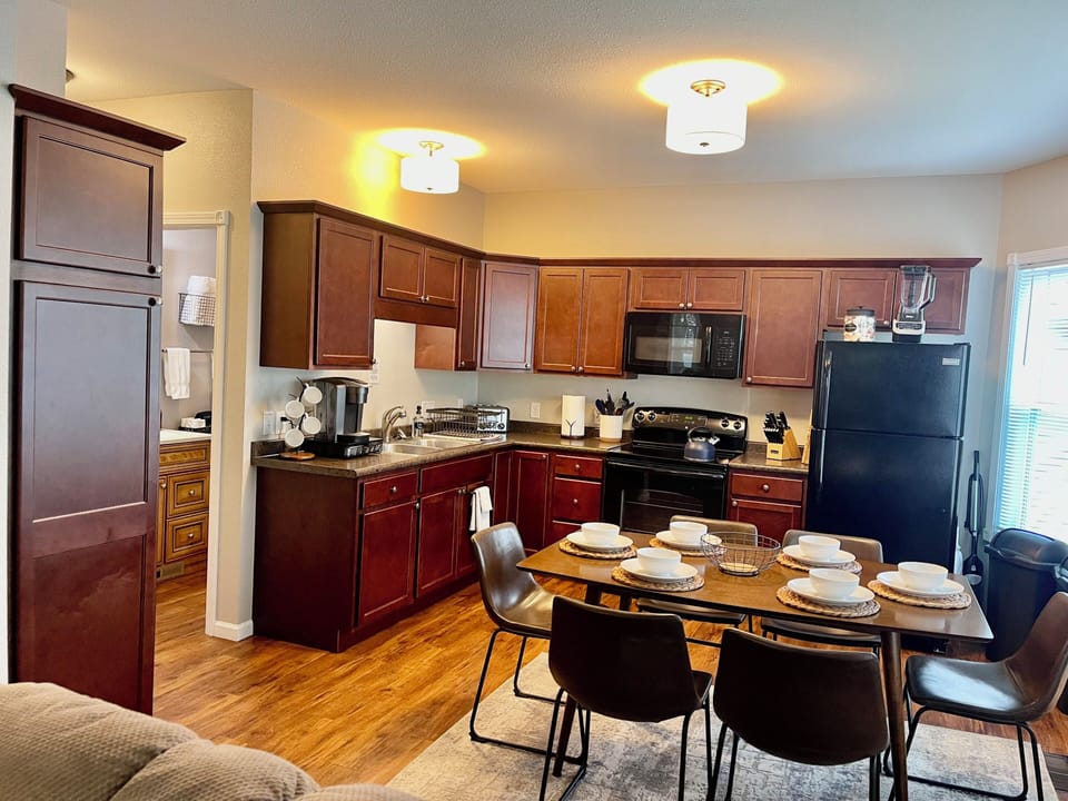Downstairs eat-in kitchen #1.  There is an additional kitchen/seating upstairs.