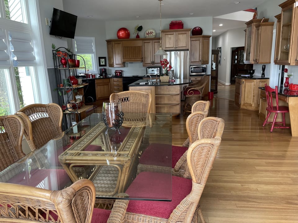In kitchen dining with side couch.