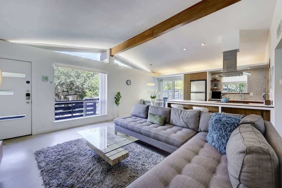 The home has an open floor plan and high ceilings in the living areas.