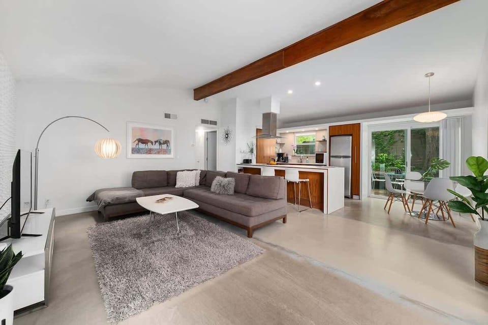 Open floor plan and high ceilings in main living areas.