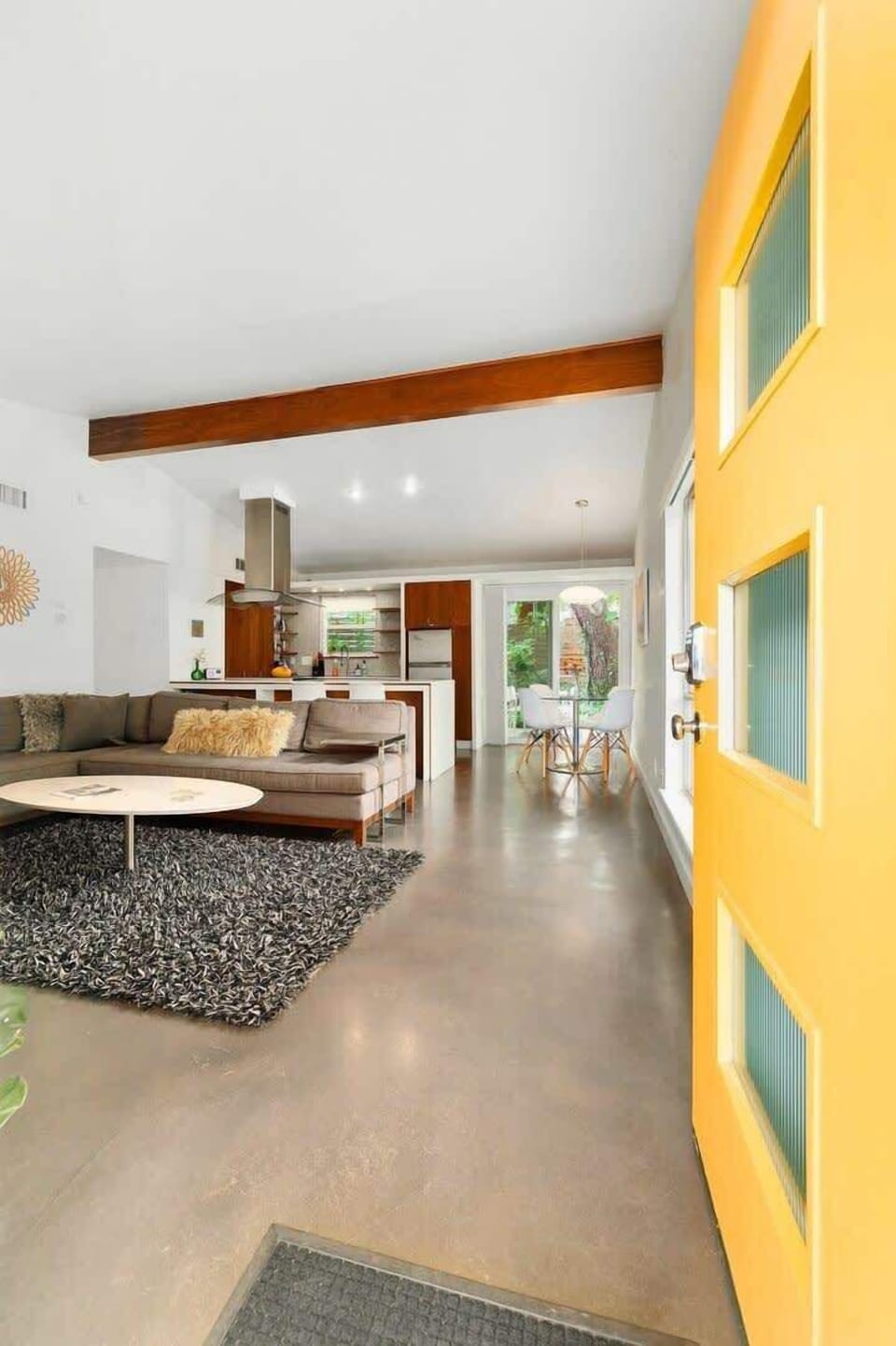 Open floor plan and high ceilings in main living areas.