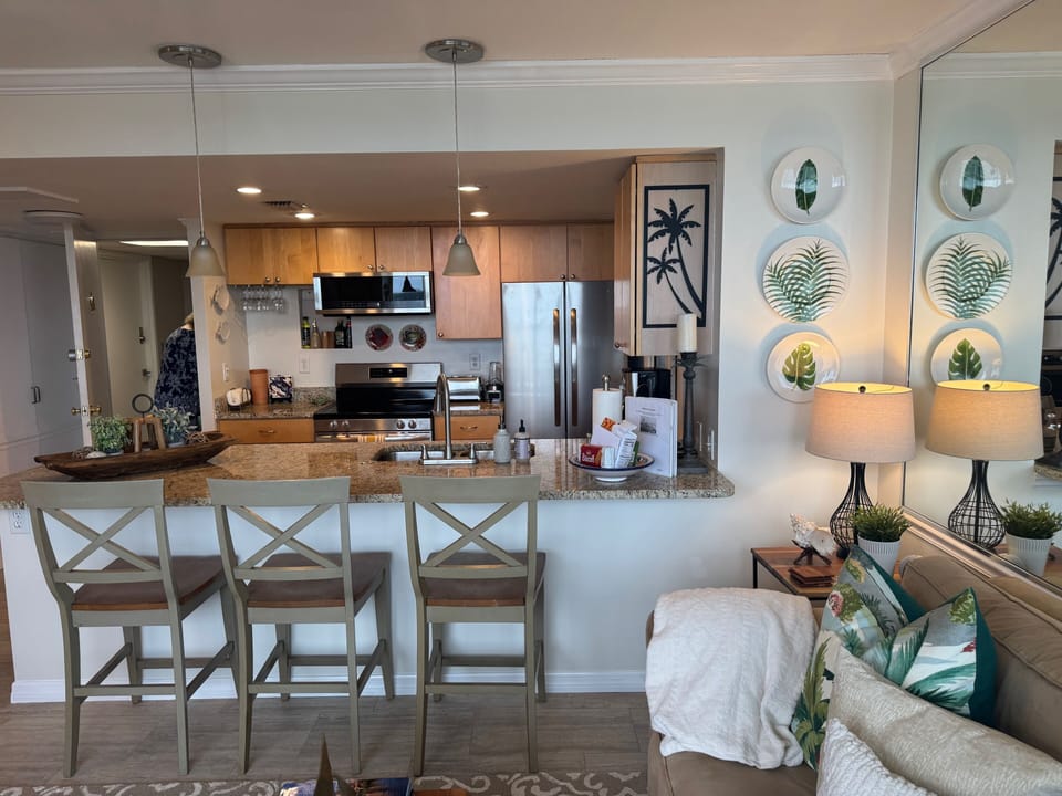View into kitchen from living room.