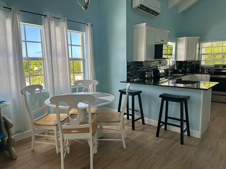 The dining room will fit  6 people comfortably.