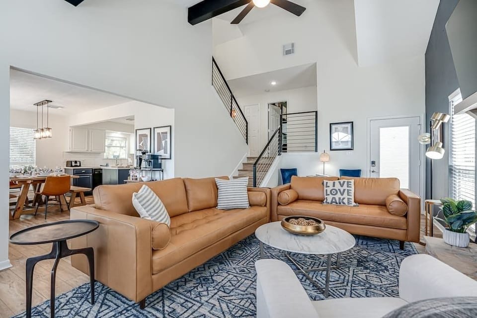 Another view of large living room. Check out the industrial black rails.