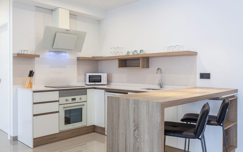 Apartment | Private kitchen | Full-size fridge, microwave, oven, stovetop