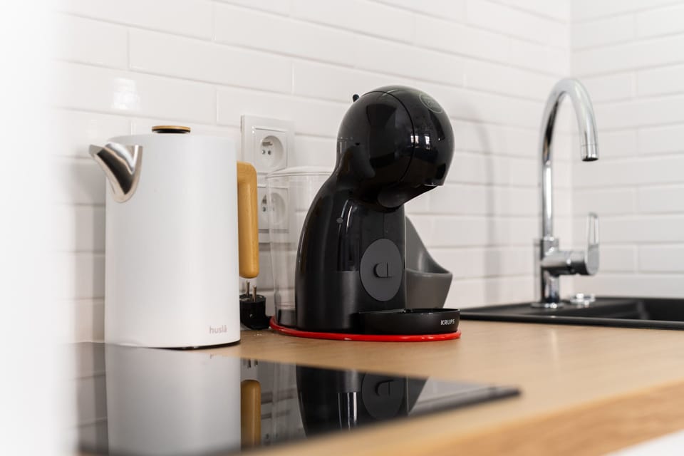The kitchenette's practical layout maximizes space and functionality.