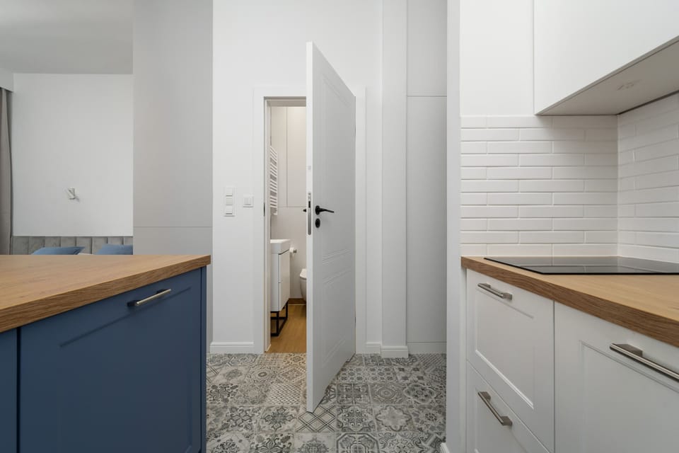 The fully equipped kitchenette includes everything you need for a home-cooked meal.
