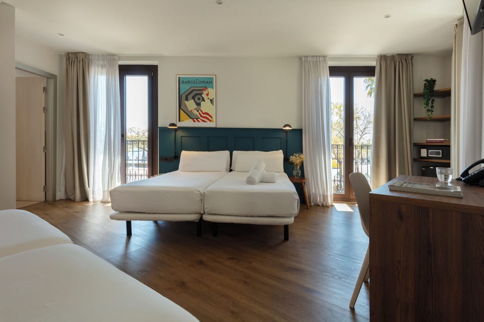 Family Room, Harbor View | Minibar, in-room safe, desk, laptop workspace