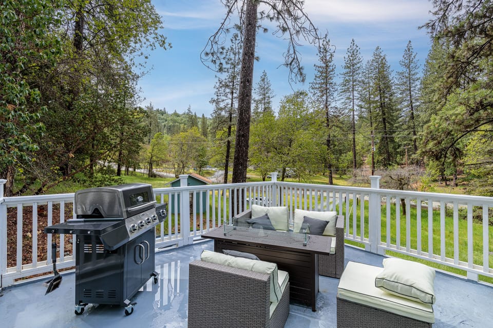 BBQ, seating and fire pit on the deck
