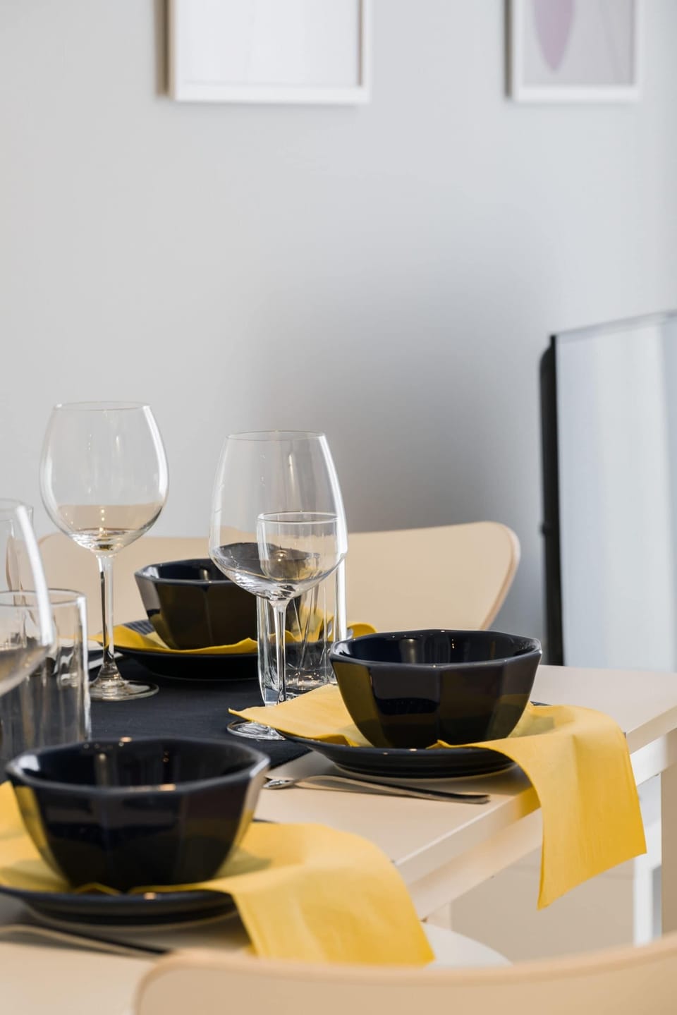 Dining table with tableware.
