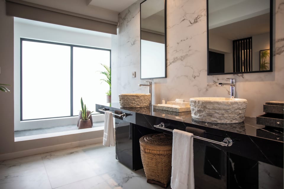 Senior Suite, Jetted Tub | Bathroom | Designer toiletries, hair dryer, bathrobes, slippers