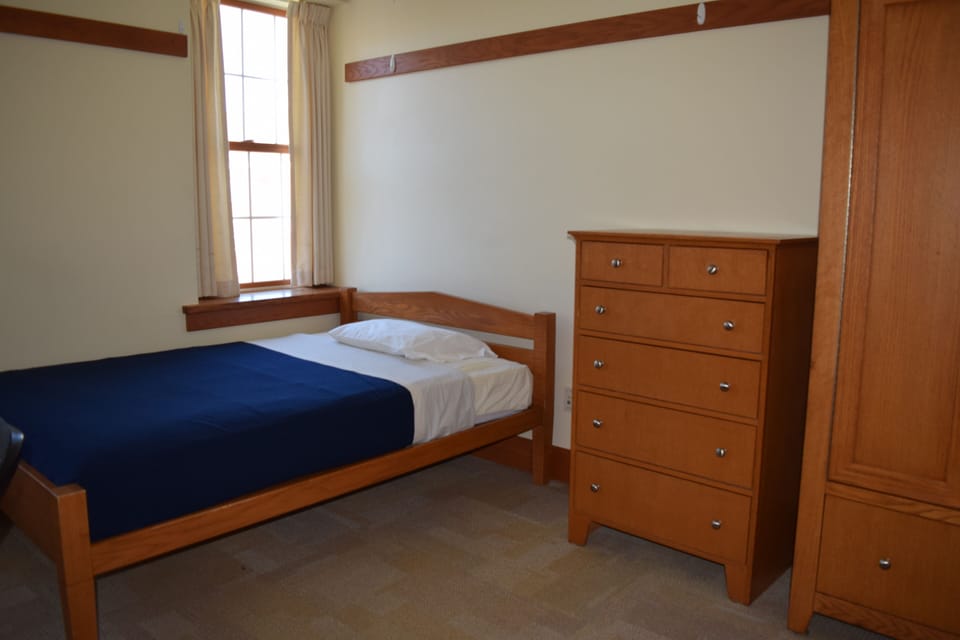 Desk, laptop workspace, free WiFi, bed sheets