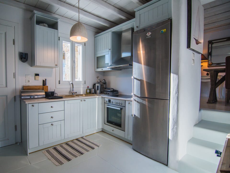 Fully Stocked Kitchen next to the Living Room 