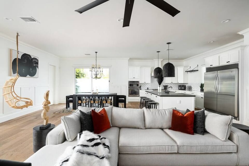 Contemporary Comfort: Our Living Room's Open Layout Welcomes You