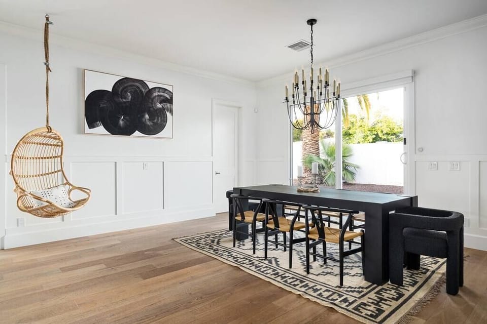 Upscale Dining Retreat: Your Table, Graced with Chandelier Gleam and Swinging Charm