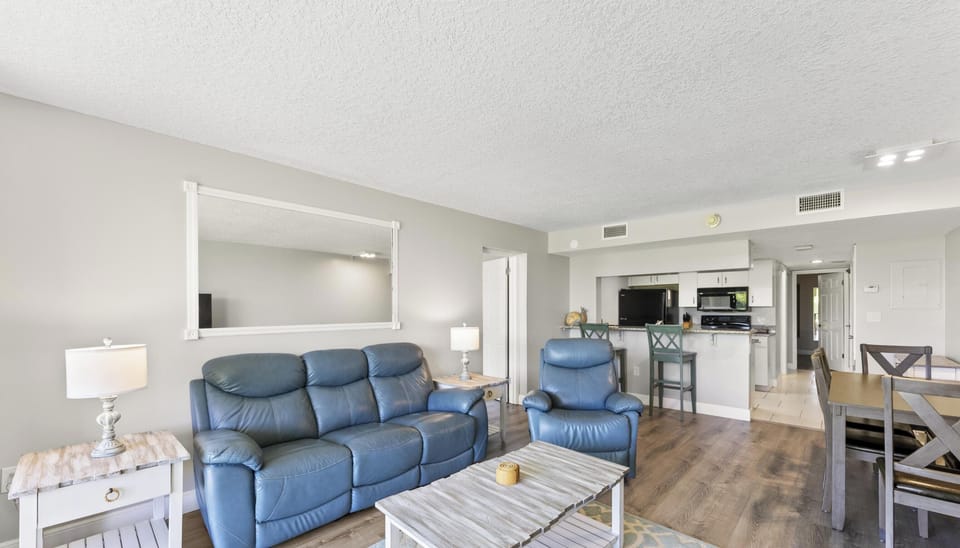 A spacious and inviting living area that blends comfort with modern style