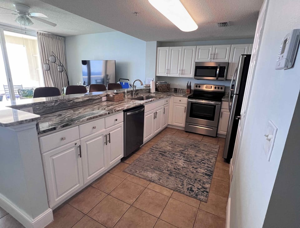 Well-equipped kitchen with great cabinet space for storage