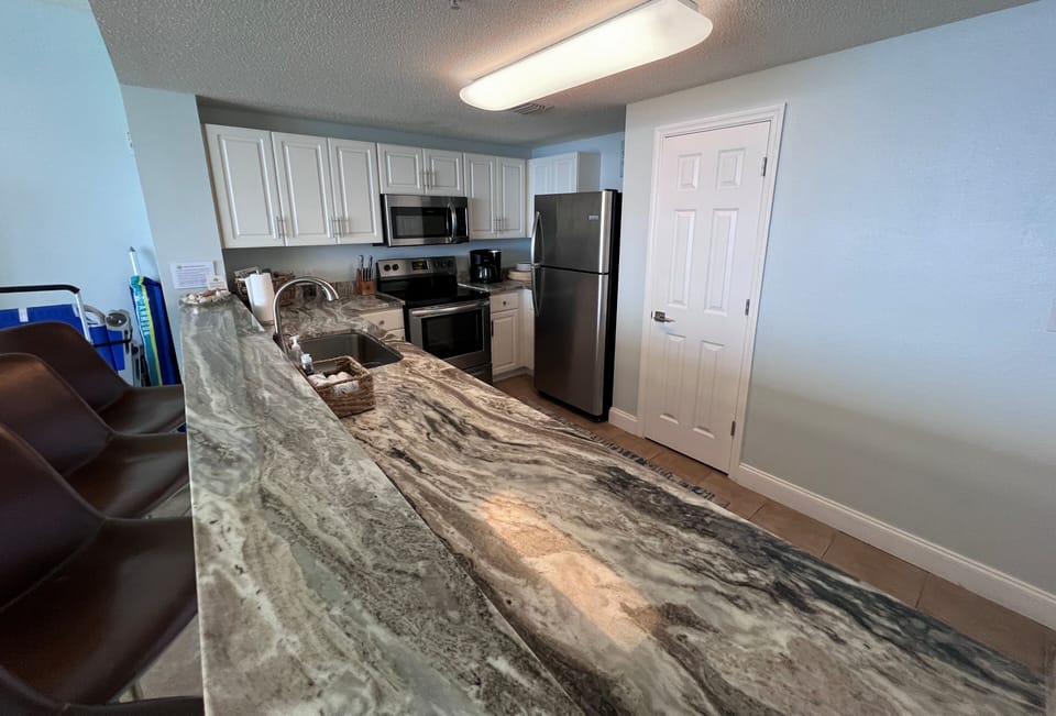 Kitchen has plenty of counter space and large closet/pantry for ample storage