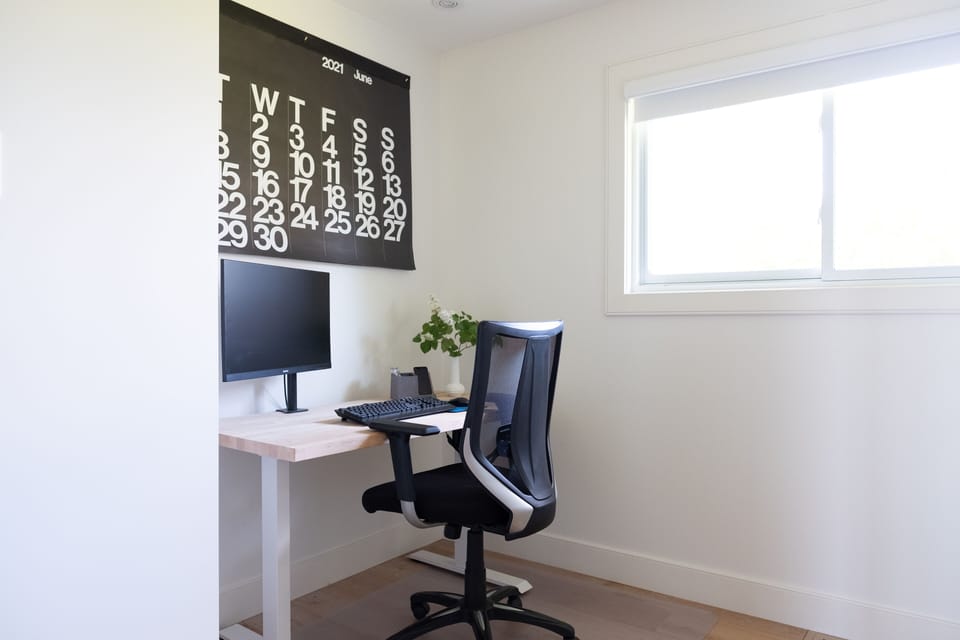 Work remotely with a sit/stand deck, office chair, monitor and keyboard. Plus Starlink internet!