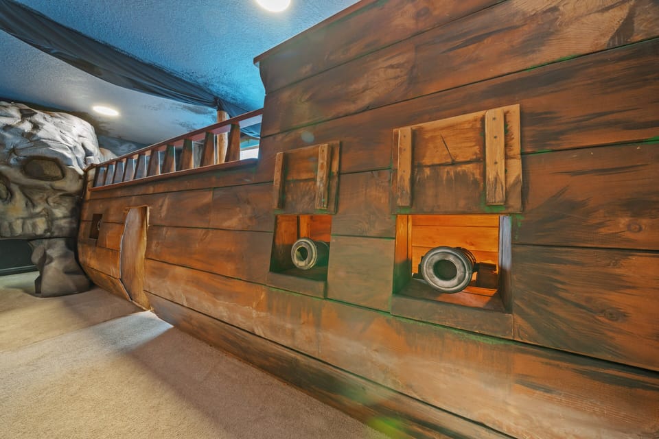 - Pirate ship playroom designed with cannons and deck  
- Creative kids space full of adventure and excitement  
- Imaginative setup makes every stay unforgettable fun