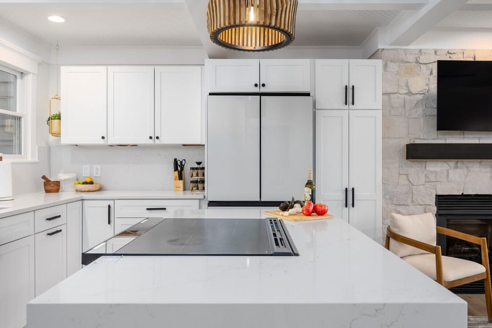 🔥 Modern kitchen meets cozy vibes – cook & connect here! 🍽️🪵