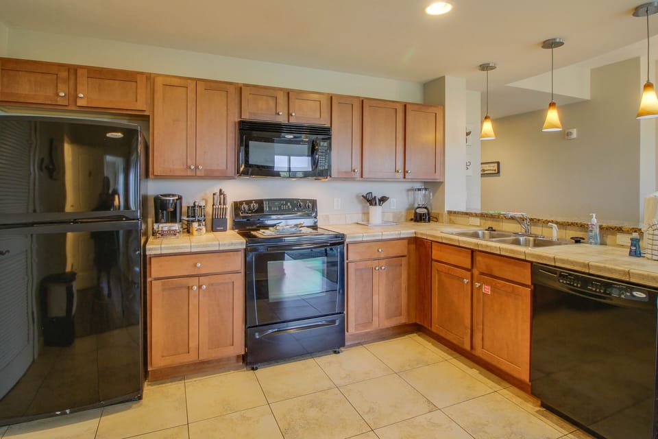Spacious kitchen + ample counterspace! We have everything you will need to make some quick meals!