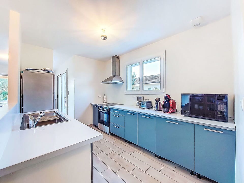 Kitchen, Countertop, Flooring, Major Appliance, Interior Design, Kitchen Appliance, Floor, Ceiling, Cabinetry, Furniture