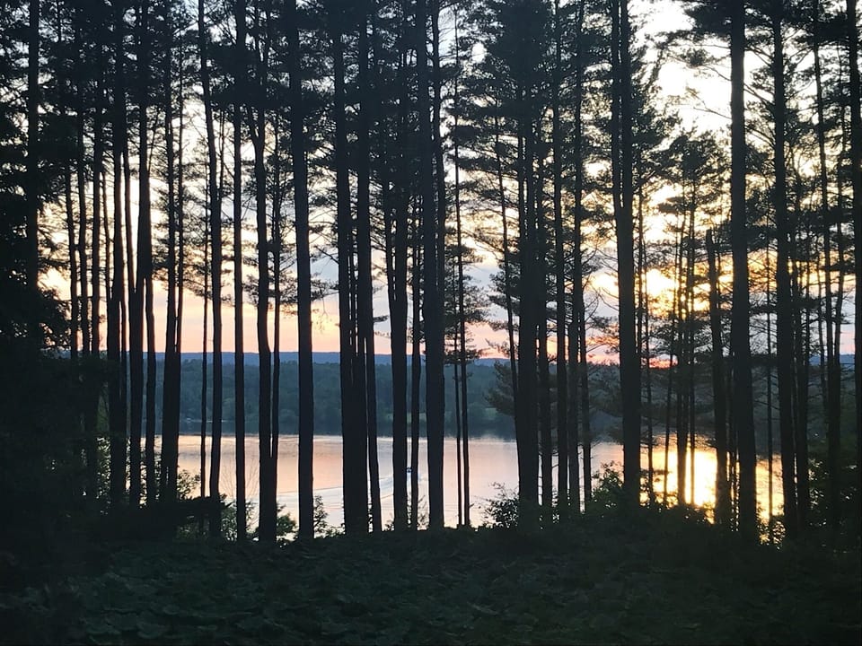 Stunning sunset views of Laurel Lake can be seen while enjoying the deck