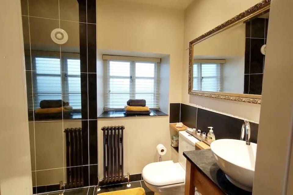 Beautiful slate en suite shower room for the twin room