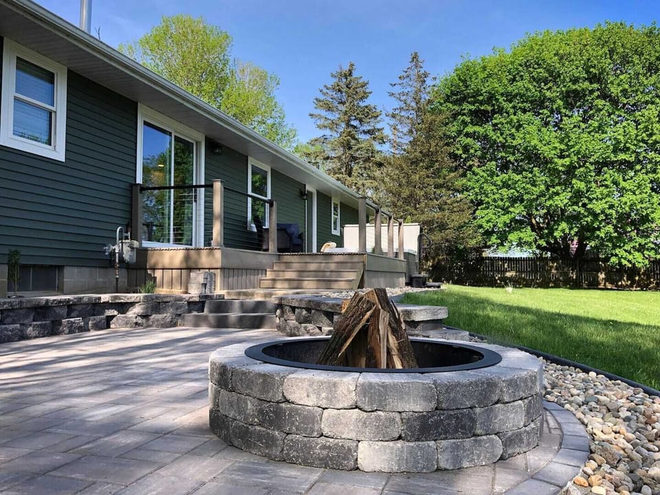 Start a fire to enjoy the quiet/serene backyard. Firewood is complimentary. There is seating provided as well on the benches around the fire! 