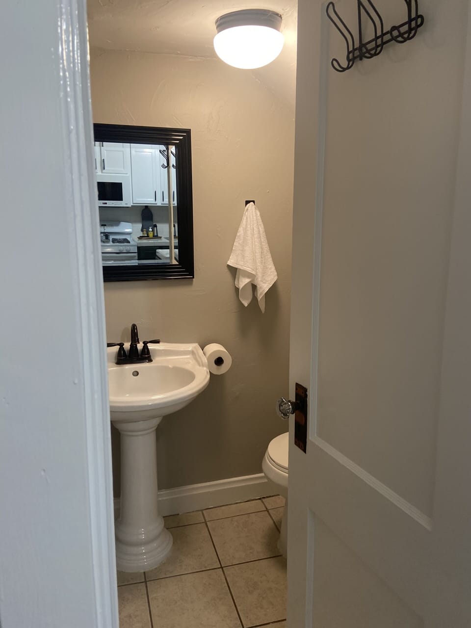 Half bath located on first floor - next to kitchen