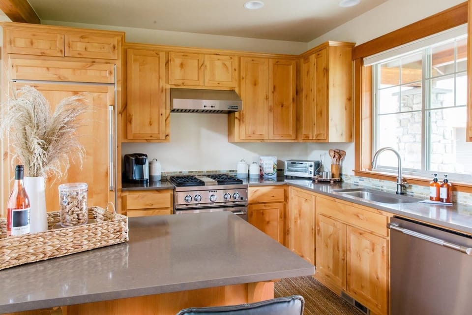 Custom kitchen featuring Jenn Air appliances and gorgeous cabinetry.