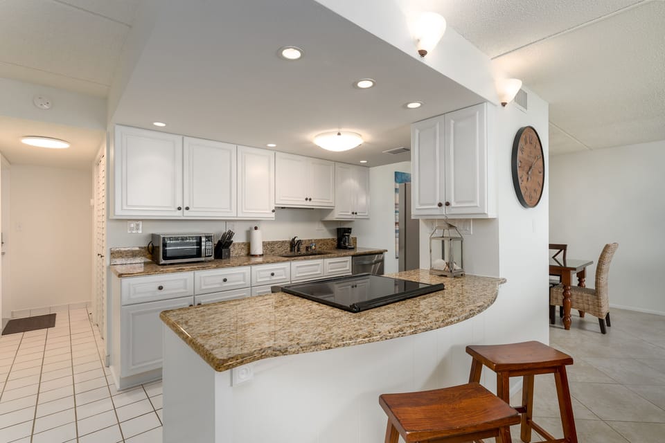 Cook in style in the updated kitchen, complete with sleek granite countertops