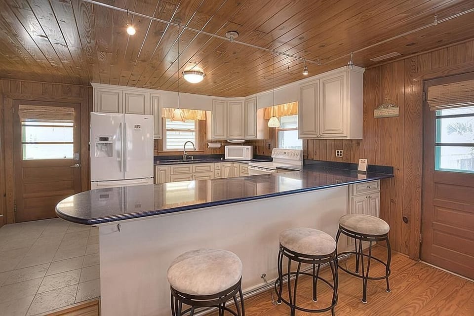 Barstools and kitchen