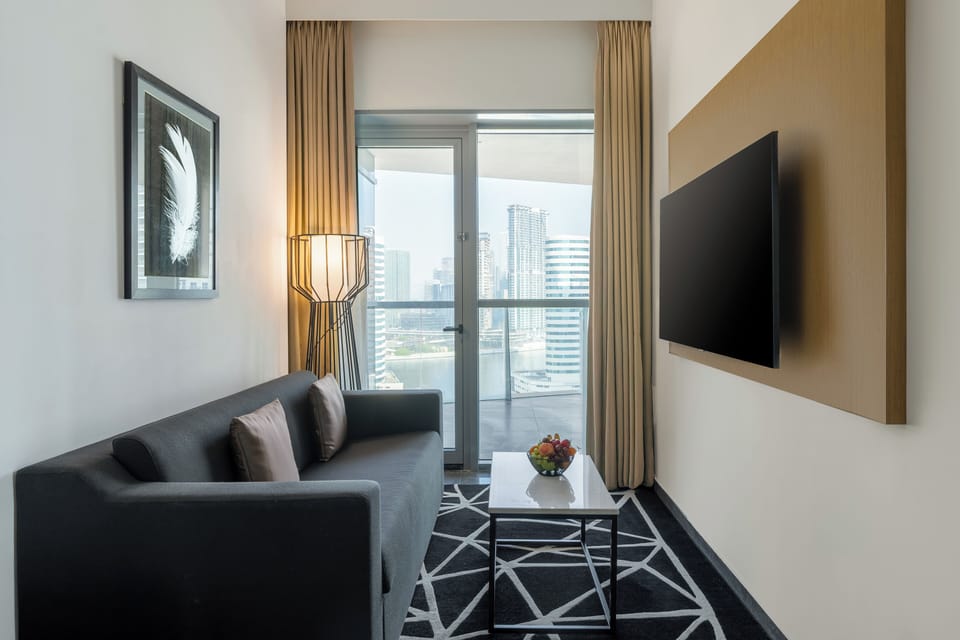 Executive Suite with Soluna Beach Resort | Down comforters, in-room safe, desk, laptop workspace