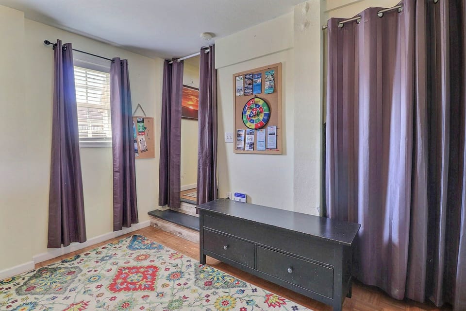 The lower level boasts a beautiful relaxation space with a washer and dryer for ultimate convenience.