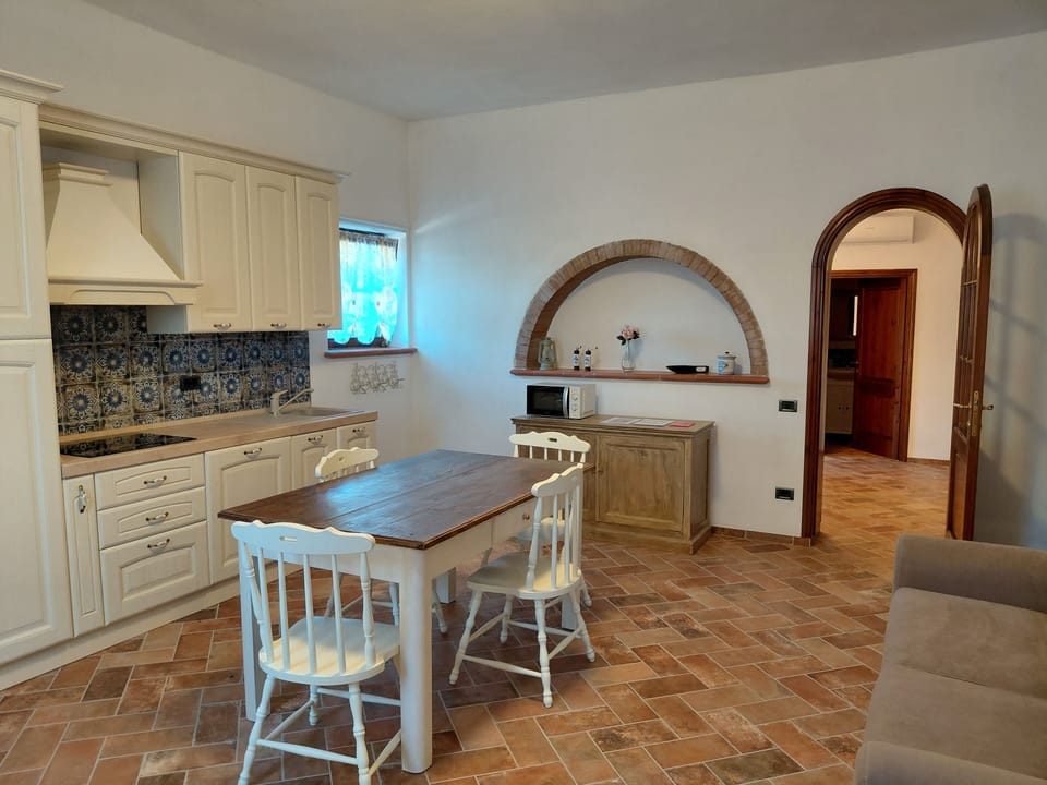 Family Apartment, Patio, Hill View | Private kitchen