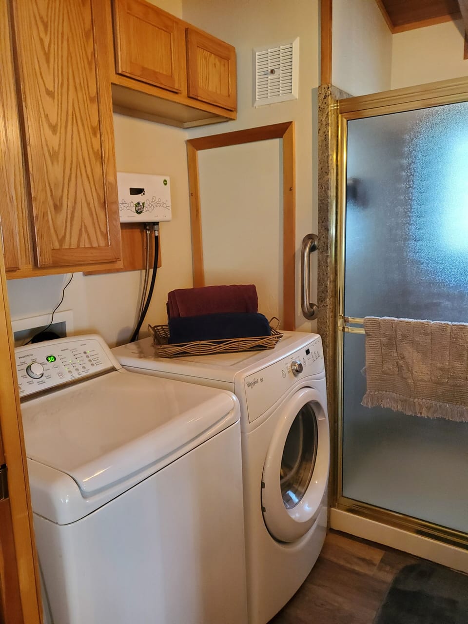 bathroom has a washer and dryer