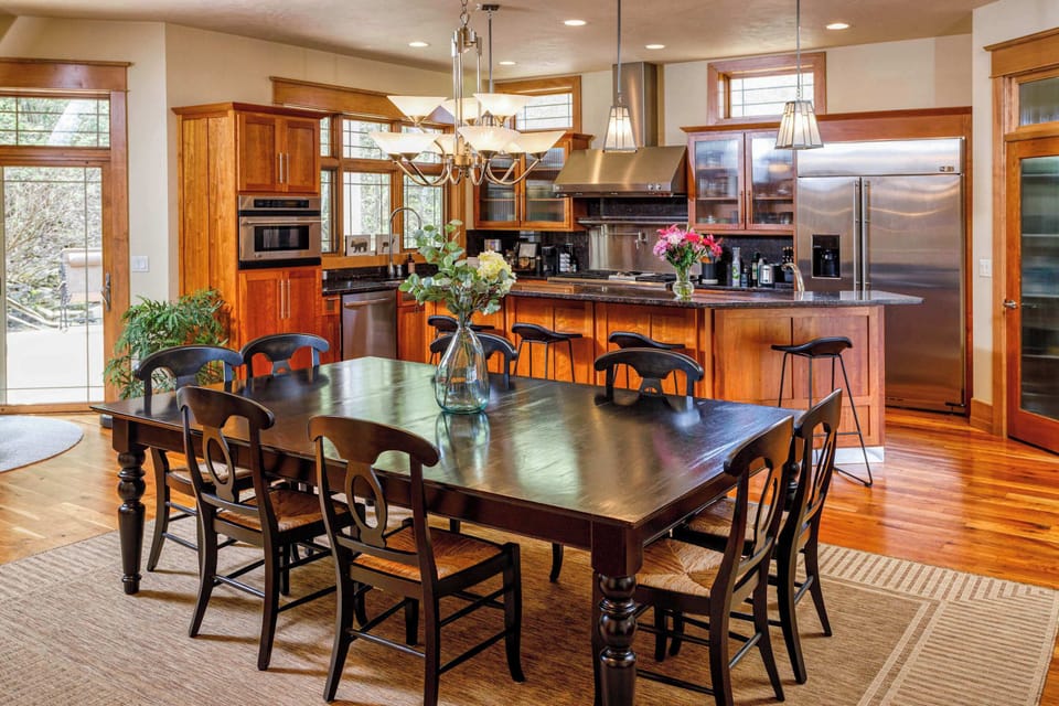The dining area is open to the kitchen to create a perfect atmosphere to gather for meal preparation and enjoyment