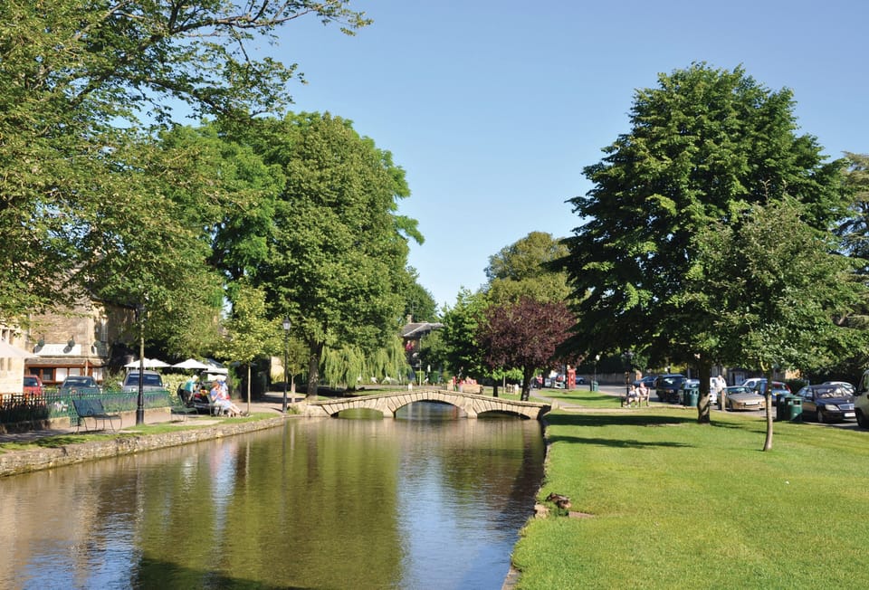 Enjoy a stroll through Bourton-on-the-Water