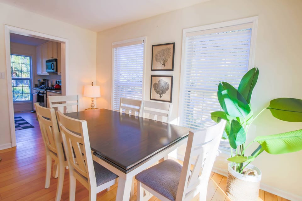 The dining area connects to both the kitchen and the living room.