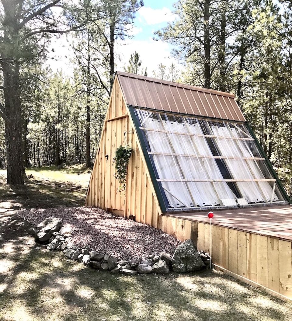Our 3 Stargazer Convertible A-Frames nestled among 10 acres of pine trees.