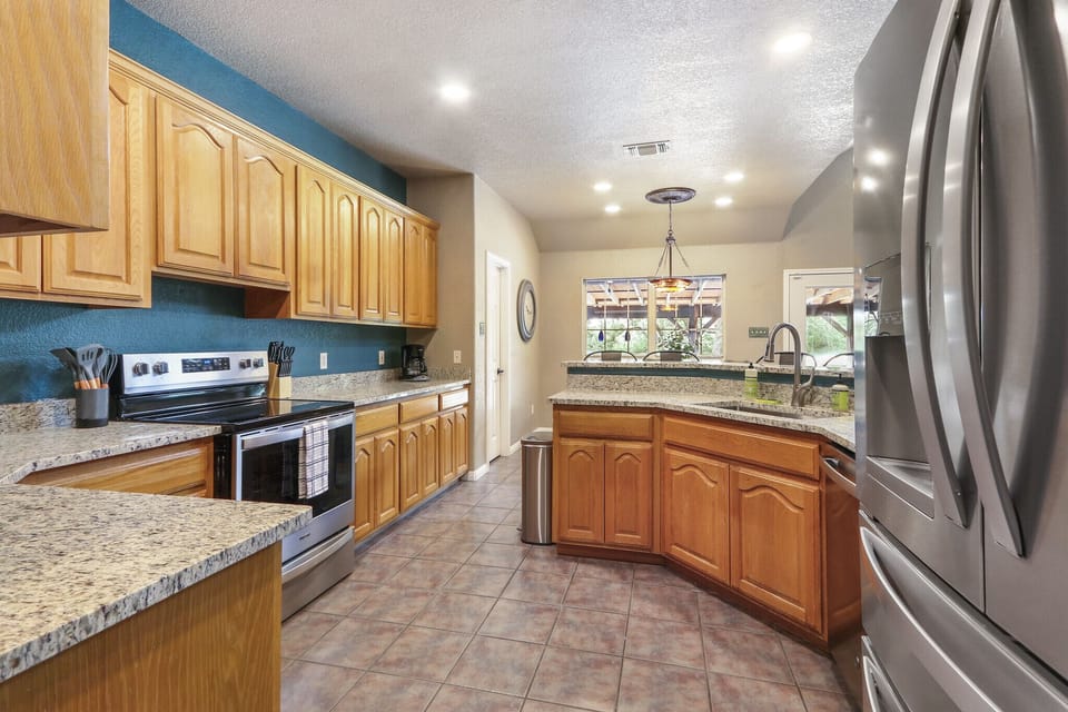 Open kitchen space looking out to dining area.