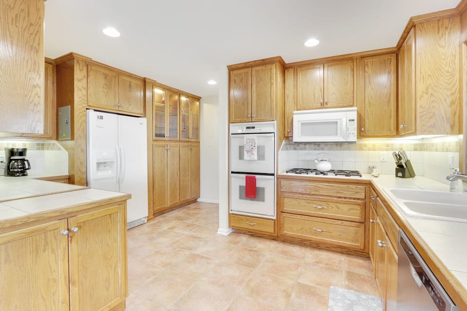 Spacious kitchen with plenty of lighting.