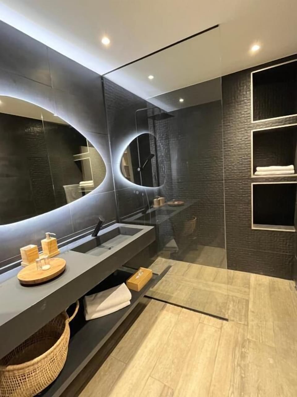 Shower, rainfall showerhead, hair dryer, towels