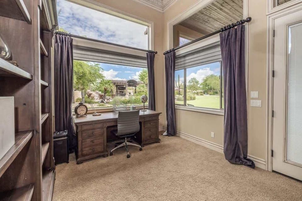 Master Bedroom Office - Overlooks the pool—blend productivity with paradise.