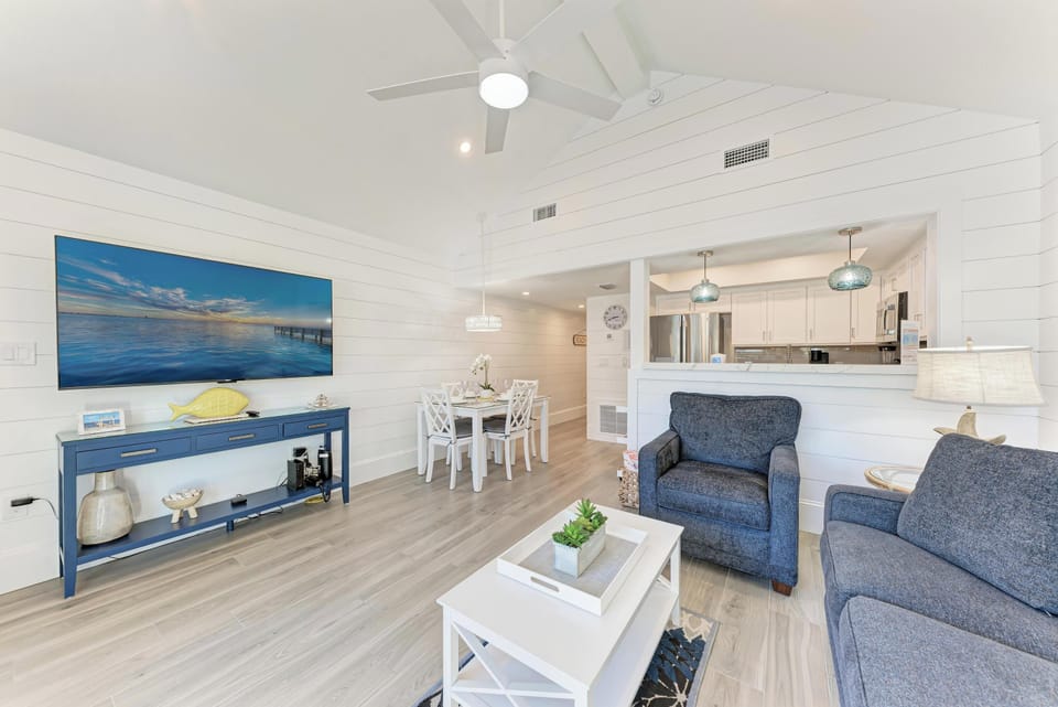 Relax in your bright, airy living space with coastal charm and modern comforts, perfect for unwinding after beach days.